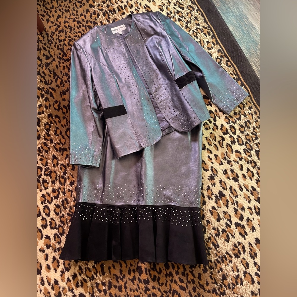 Leather suit with rhinestones, and a fish, tail bottom.